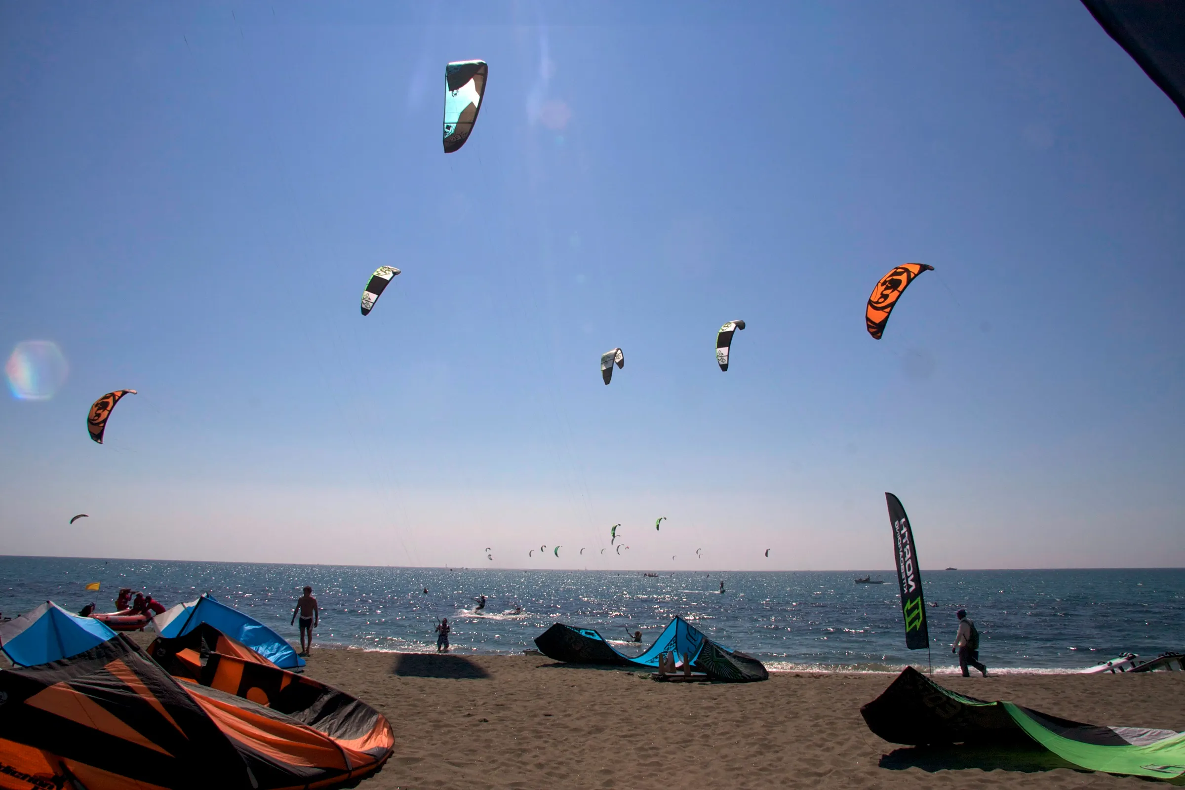 Kite racers on the water off Ostia